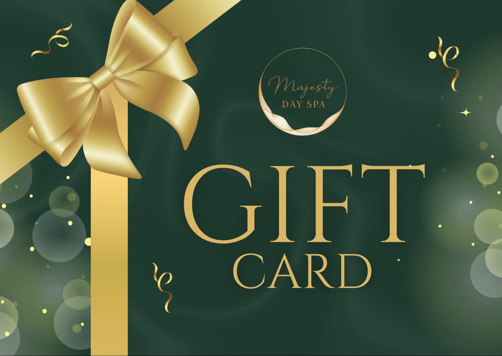 Majesty Day Spa gift card in deep green with a satin gold bow